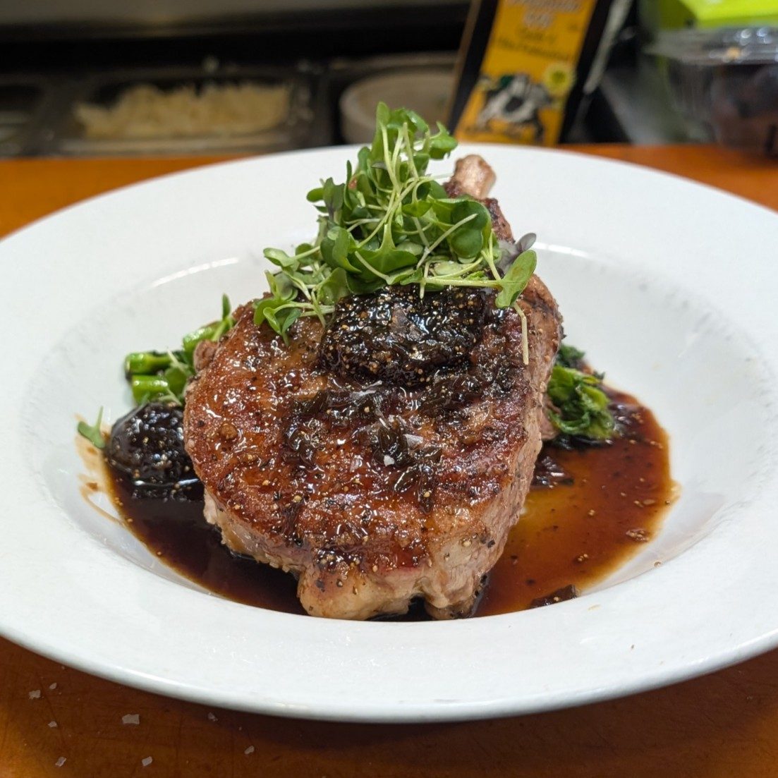 14oz Prime Porkchop with homemade fig jam and broccoli rab.